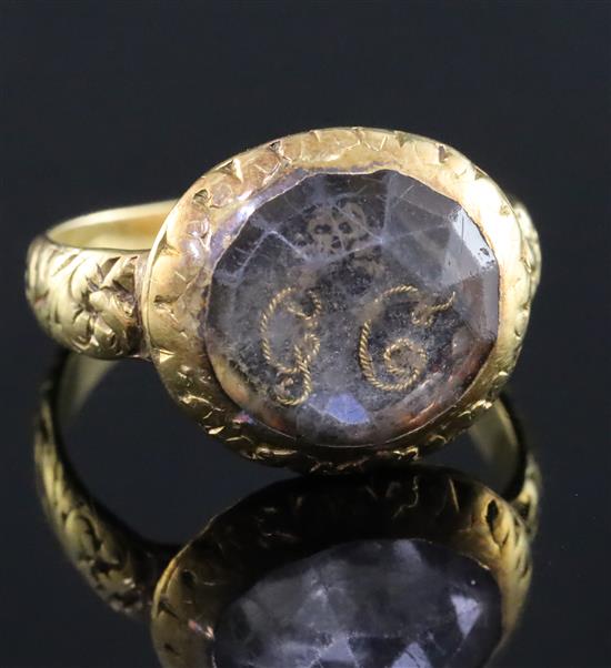 A late 17th century gold and Stuart crystal memento mori ring, size J.